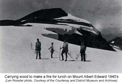 Carrying wood to make a fire for lunch on Mount Albert Edward 1940'S